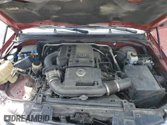 2009 Nissan Frontier SE with VIN 1N6AD09W49C404296, listed as a Copart auction lot 61040855 with 144,321 mi miles and Salvage title. Bid and sale history available at DreamBid. Image 11.