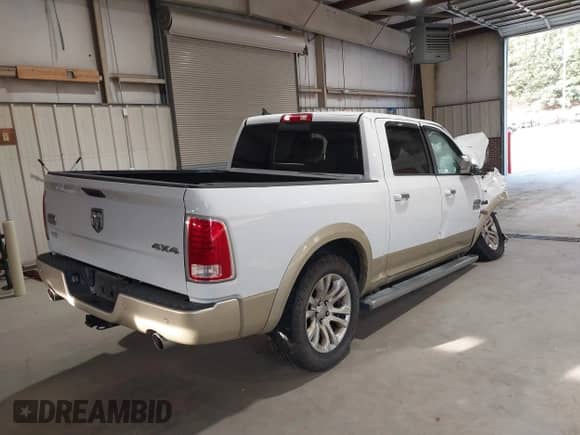 2014 Ram 1500 Longhorn z VIN 1C6RR7PT2ES176525, wystawiony jako IAAI lot #43267050 z przebiegiem 160 941 mil mil oraz . Historia ofert i sprzedaży dostępna na DreamBid. Obrazek 4.
