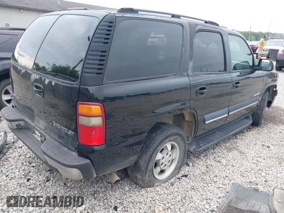 2003 Chevrolet Tahoe LS with VIN 1GNEC13Z73J300086, listed as a IAAI auction lot 42631182 with 258,536 mi miles and . Bid and sale history available at DreamBid. Image 4.
