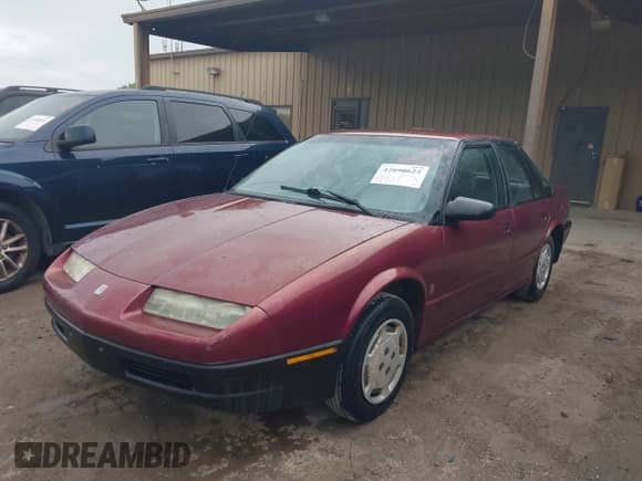 1994 Saturn SL with VIN 1G8ZH5594RZ230566, listed as a IAAI auction lot 42090623 with 149,191 mi miles and . Bid and sale history available at DreamBid. Image 2.