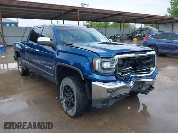 2018 GMC Sierra 1500 SLT z VIN 3GTU2NEC3JG132176, wystawiony jako IAAI lot #42669979 z przebiegiem 200 653 mil mil oraz . Historia ofert i sprzedaży dostępna na DreamBid. Obrazek 1.