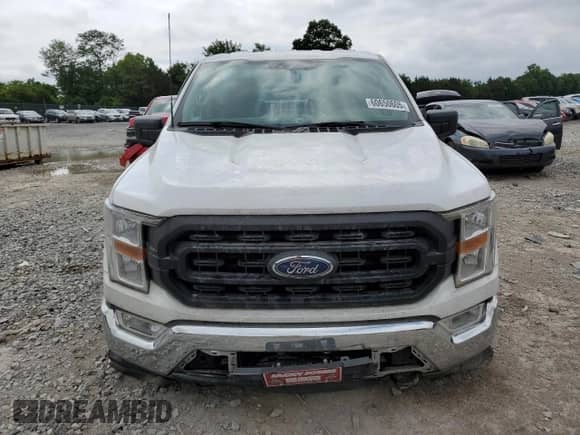 2021 Ford F-150 XL z VIN 1FTMF1EP7MKE72931, wystawiony jako Copart lot #60650605 z przebiegiem 23 825 mil mil oraz Szkoda całkowita • Salvage title. Historia ofert i sprzedaży dostępna na DreamBid. Obrazek 5.