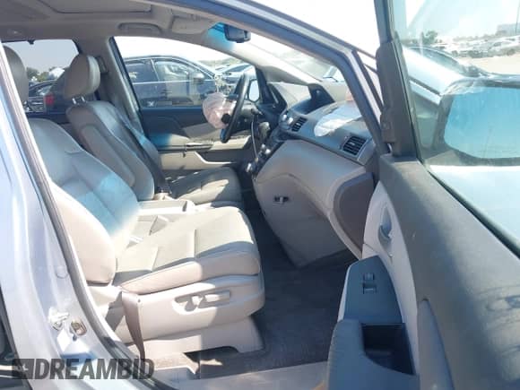 2012 Honda Odyssey Touring with VIN 5FNRL5H97CB130670, listed as a IAAI auction lot 43438076 with 198,047 mi miles and . Bid and sale history available at DreamBid. Image 5.