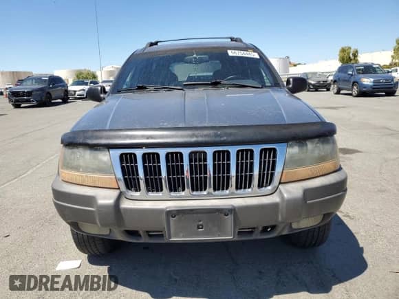 2001 Jeep Grand Cherokee Laredo с VIN 1J4GW48S01C704008, выставлен на аукционе Copart как лот 66754445 с пробегом 173 445 миль миль и Списание • Salvage title. История ставок и продаж доступна на DreamBid. Изображение 5.