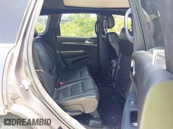 2017 Jeep Grand Cherokee Overland with VIN 1C4RJFCG0HC778681, listed as a IAAI auction lot 42573123 with 83,616 mi miles and . Bid and sale history available at DreamBid. Image 8.