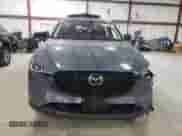 2025 Mazda CX-5 S Carbon Edition z VIN JM3KFBCM0S0599719, wystawiony jako Copart lot #64725555 z przebiegiem 3 501 mil mil oraz Szkoda całkowita • Salvage title. Historia ofert i sprzedaży dostępna na DreamBid. Obrazek 5.