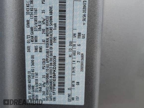 2023 Ford F-150 XL with VIN 1FTFW1E59PKD39339, listed as a Copart auction lot 80979315 with 83,117 mi miles and Salvage title. Bid and sale history available at DreamBid. Image 12.