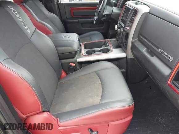 2018 Ram 1500 Rebel with VIN 1C6RR7YT4JS151036, listed as a IAAI auction lot 41988370 with 72,587 mi miles and . Bid and sale history available at DreamBid. Image 5.