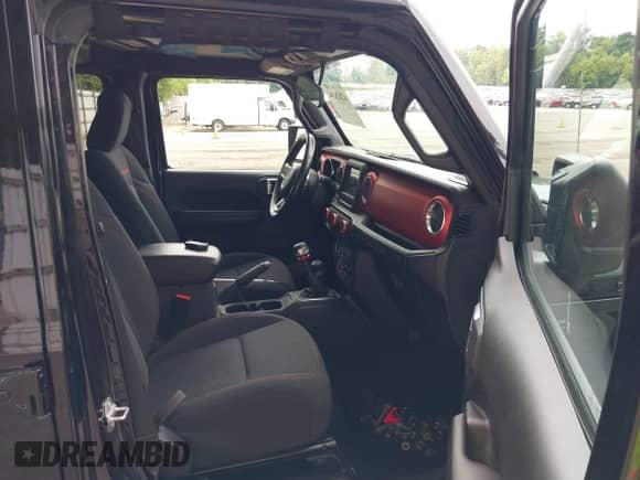 2021 Jeep Wrangler Unlimited Rubicon with VIN 1C4HJXFG7MW744419, listed as a IAAI auction lot 42826204 with 25,948 mi miles and . Bid and sale history available at DreamBid. Image 5.