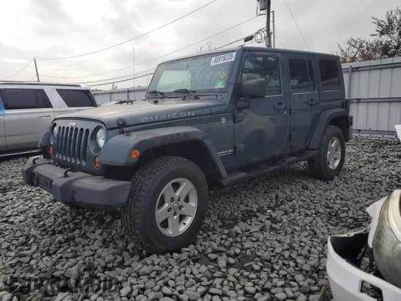 2007 Jeep Wrangler Unlimited Rubicon with VIN 1J8GA69167L145281, listed as a Copart auction lot 68919235 with 148,839 mi miles and Clean title. Bid and sale history available at DreamBid. Image 1.