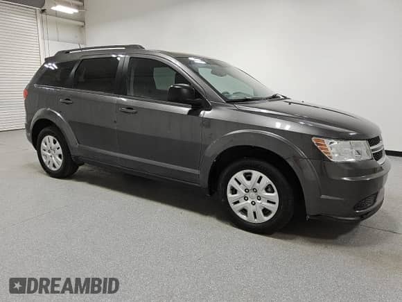 2017 Dodge Journey SE with VIN 3C4PDCAB8HT503892, listed as a Copart auction lot 80394465 with 102,143 mi miles and Clean title. Bid and sale history available at DreamBid. Image 4.