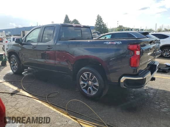 2023 Chevrolet Silverado 1500 LT with VIN 1GCRDDED8PZ307131, listed as a Copart auction lot 73734334 with 11,384 mi miles and Salvage title. Bid and sale history available at DreamBid. Image 2.