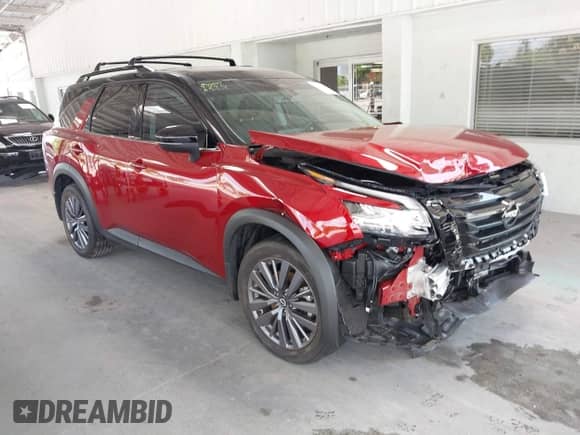 2023 Nissan Pathfinder SL z VIN 5N1DR3CB3PC256059, wystawiony jako IAAI lot #42234526 z przebiegiem 7 320 mil mil oraz . Historia ofert i sprzedaży dostępna na DreamBid. Obrazek 1.