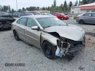 2016 Toyota Camry LE z VIN 4T1BD1FK5GU181073, wystawiony jako IAAI lot #42910665 z przebiegiem 134 118 mil mil oraz . Historia ofert i sprzedaży dostępna na DreamBid. Obrazek 1.