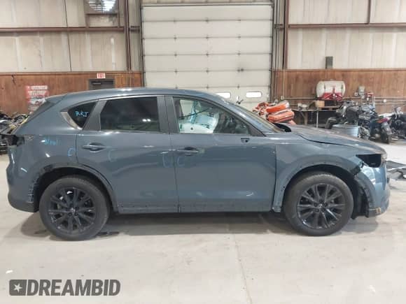 2024 Mazda CX-5 S Preferred z VIN JM3KFBCM0R0398834, wystawiony jako IAAI lot #42841174 z przebiegiem 6 031 mil mil oraz . Historia ofert i sprzedaży dostępna na DreamBid. Obrazek 13.