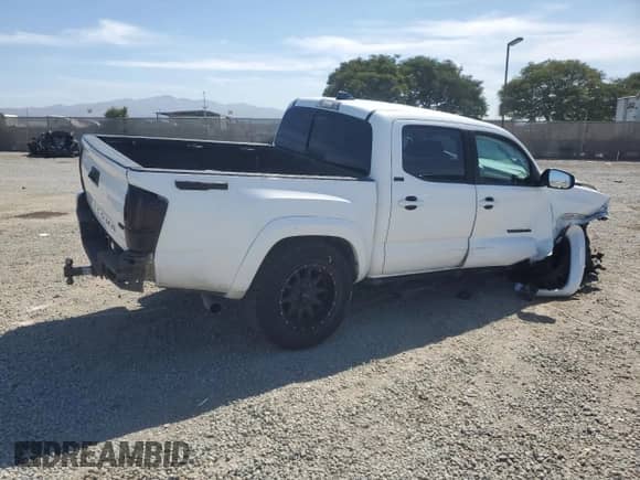 2020 Toyota Tacoma SR5 с VIN 3TMAZ5CN0LM120428, выставлен на аукционе Copart как лот 69748535 с пробегом 147 306 миль миль и Списание • Salvage title. История ставок и продаж доступна на DreamBid. Изображение 3.