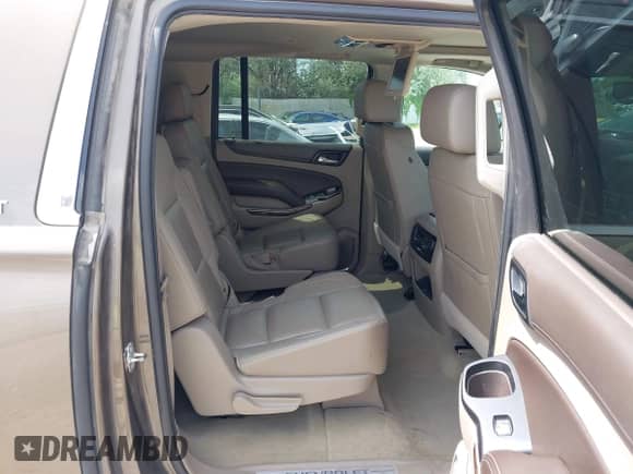 2016 Chevrolet Suburban LT with VIN 1GNSKHKC9GR275615, listed as a IAAI auction lot 42296718 with 91,853 mi miles and . Bid and sale history available at DreamBid. Image 8.