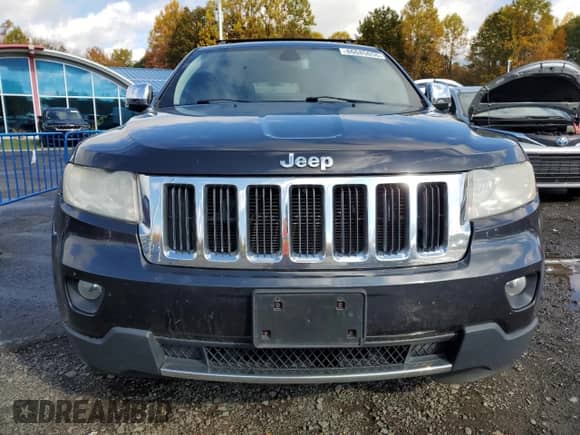 2013 Jeep Grand Cherokee Limited z VIN 1C4RJFBG2DC640359, wystawiony jako Copart lot #86685655 z przebiegiem 150 067 mil mil oraz Szkoda całkowita • Salvage title. Historia ofert i sprzedaży dostępna na DreamBid. Obrazek 5.