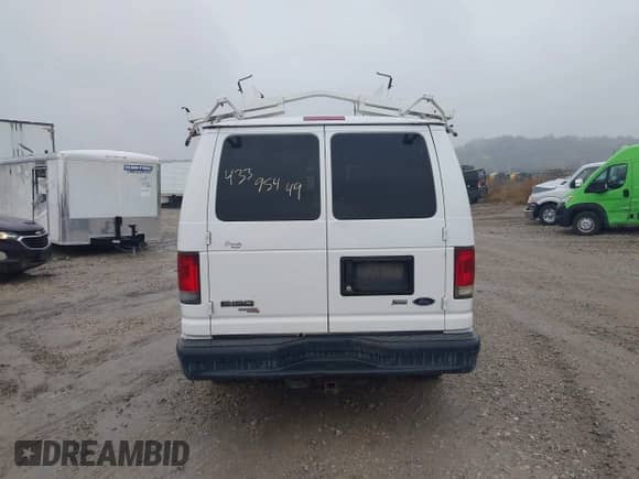 2013 Ford Econoline Cargo Commercial with VIN 1FTNE1EW8DDA38309, listed as a IAAI auction lot 43395449 with 252,665 mi miles and . Bid and sale history available at DreamBid. Image 16.