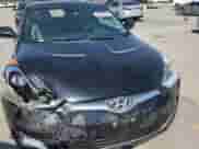 2014 Hyundai Veloster с VIN KMHTC6AD0EU186286, выставлен на аукционе Copart как лот 82402835 с пробегом 88 126 миль миль и Списание • Salvage title. История ставок и продаж доступна на DreamBid. Изображение 13.