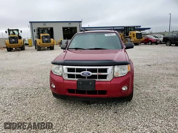 2011 Ford Escape XLT with VIN 1FMCU9D71BKC11644, listed as a Copart auction lot 55958615 with 248,084 mi miles and Salvage title. Bid and sale history available at DreamBid. Image 14.