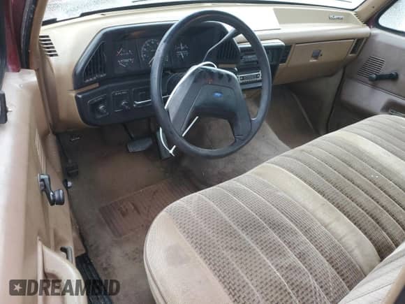 1989 Ford F-150 z VIN 1FTDF15Y7KNB52741, wystawiony jako Copart lot #41561205 z przebiegiem 212 932 mil mil oraz Szkoda całkowita • Salvage title. Historia ofert i sprzedaży dostępna na DreamBid. Obrazek 8.