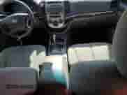 2012 Hyundai Santa Fe GLS с VIN 5XYZGDAG7CG159196, выставлен на аукционе Copart как лот 62747305 с пробегом 175 156 миль миль и Списание • Salvage title. История ставок и продаж доступна на DreamBid. Изображение 8.