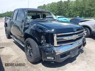 2007 Chevrolet Silverado 1500 1LT with VIN 1GCEC19C77Z516409, listed as a IAAI auction lot 42334916 with 210,099 mi miles and . Bid and sale history available at DreamBid. Image 1.