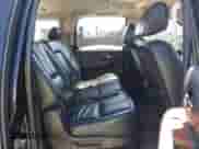 2008 Chevrolet Suburban LTZ z VIN 3GNFK16338G160531, wystawiony jako IAAI lot #42575633 z przebiegiem 215 472 mil mil oraz . Historia ofert i sprzedaży dostępna na DreamBid. Obrazek 8.