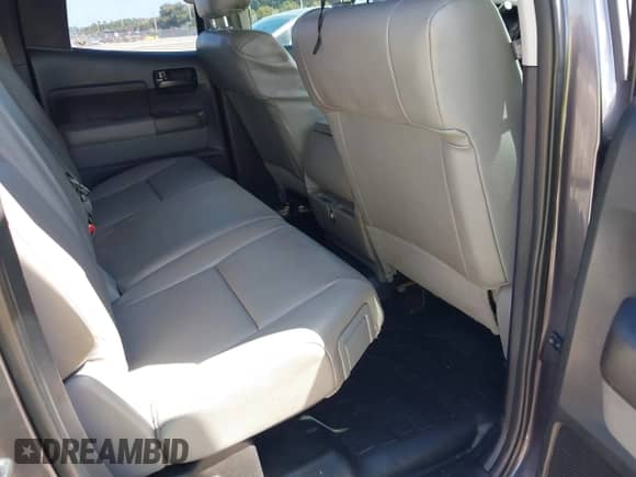 2012 Toyota Tundra z VIN 5TFRU5F19CX026861, wystawiony jako IAAI lot #41827542 z przebiegiem 135 428 mil mil oraz . Historia ofert i sprzedaży dostępna na DreamBid. Obrazek 8.
