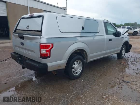 2019 Ford F-150 XL with VIN 1FTMF1C54KKD52096, listed as a IAAI auction lot 42130212 with 131,877 mi miles and . Bid and sale history available at DreamBid. Image 4.