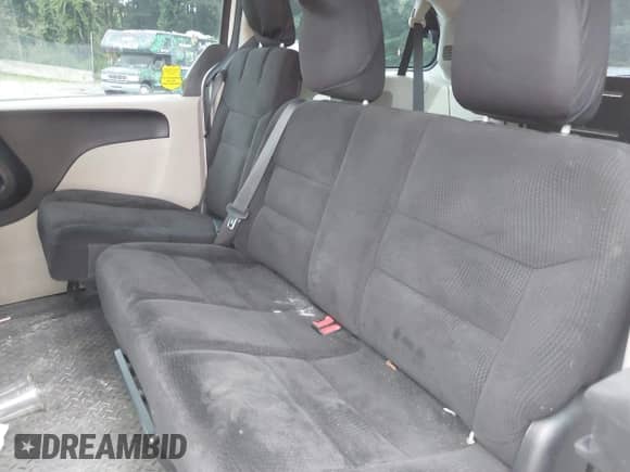 2014 Dodge Grand Caravan SE with VIN 2C4RDGBG6ER327935, listed as a IAAI auction lot 42778118 with 107,766 mi miles and . Bid and sale history available at DreamBid. Image 8.