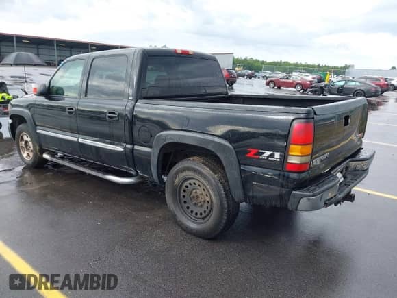 2006 GMC Sierra 1500 SLT with VIN 2GTEK13T561232618, listed as a IAAI auction lot 42086899 with 310,473 mi miles and . Bid and sale history available at DreamBid. Image 3.