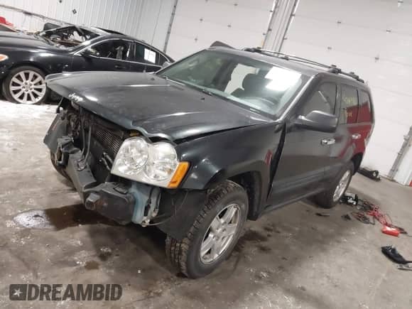 2005 Jeep Grand Cherokee Laredo with VIN 1J4HS48N35C658626, listed as a IAAI auction lot 42449786 with Not provided miles and . Bid and sale history available at DreamBid. Image 2.