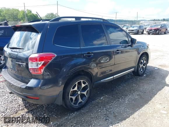 2015 Subaru Forester XT Touring z VIN JF2SJGWC3FH507521, wystawiony jako IAAI lot #42952660 z przebiegiem 125 093 mil mil oraz . Historia ofert i sprzedaży dostępna na DreamBid. Obrazek 4.
