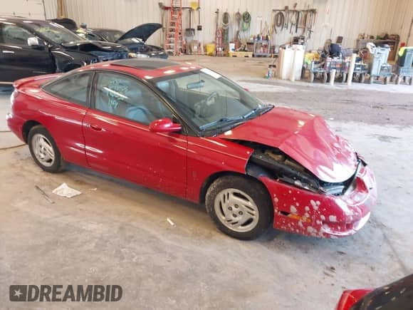 1997 Saturn 2dr Coupe with VIN 1G8ZH1277VZ110038, listed as a IAAI auction lot 42546514 with 83,164 mi miles and . Bid and sale history available at DreamBid. Image 1.