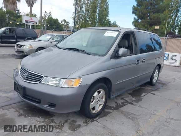2000 Honda Odyssey EX z VIN 2HKRL1861YH618293, wystawiony jako IAAI lot #43250697 z przebiegiem 119 896 mil mil oraz . Historia ofert i sprzedaży dostępna na DreamBid. Obrazek 2.