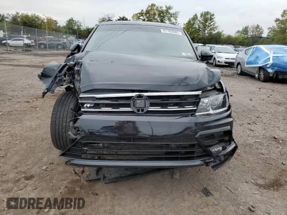 2021 Volkswagen Tiguan SE z VIN 3VV2B7AX9MM088543, wystawiony jako Copart lot #81762665 z przebiegiem Nie podano mil oraz Szkoda całkowita • Salvage title. Historia ofert i sprzedaży dostępna na DreamBid. Obrazek 5.