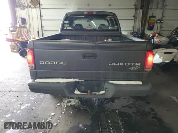 2003 Dodge Dakota Sport with VIN 1D7HG38X43S229006, listed as a Copart auction lot 44932005 with 226,935 mi miles and Salvage title. Bid and sale history available at DreamBid. Image 6.