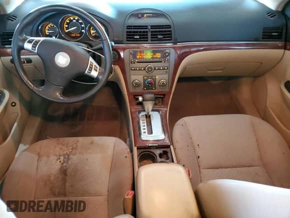 2008 Saturn Aura XE с VIN 1G8ZS57B28F199111, выставлен на аукционе Copart как лот 65072605 с пробегом 70 717 миль миль и Списание • Salvage title. История ставок и продаж доступна на DreamBid. Изображение 8.