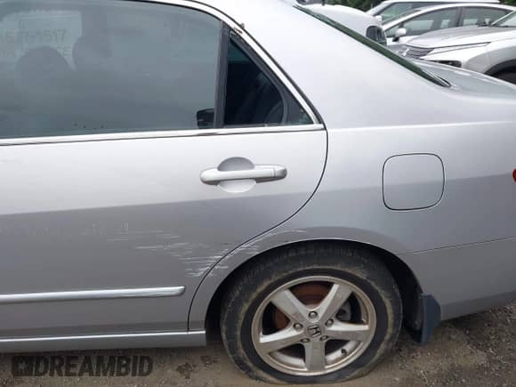 2005 Honda Accord EX with VIN 1HGCM56745A000167, listed as a IAAI auction lot 42932218 with 263,447 mi miles and . Bid and sale history available at DreamBid. Image 6.