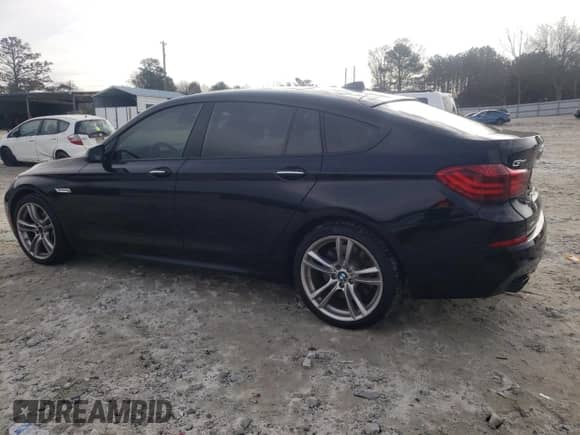 2015 BMW 5 Series 550i Gran Turismo xDrive with VIN WBA5M0C58FD085038, listed as a Copart auction lot 42856525 with 134,798 mi miles and Salvage title. Bid and sale history available at DreamBid. Image 2.