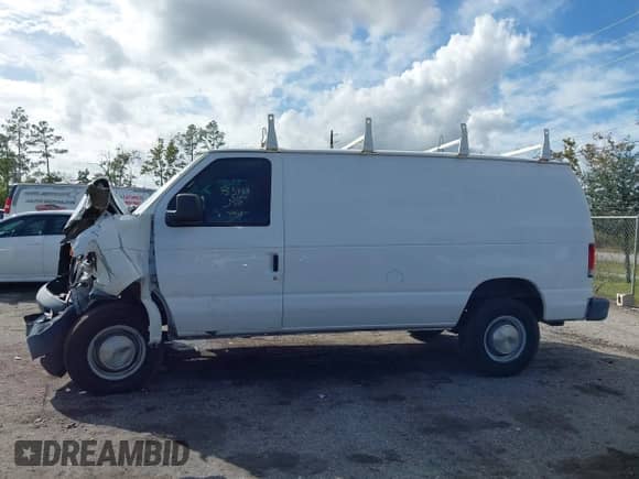 2013 Ford Econoline Cargo Commercial with VIN 1FTNE2EW0DDA41310, listed as a IAAI auction lot 43405112 with 185,163 mi miles and . Bid and sale history available at DreamBid. Image 14.