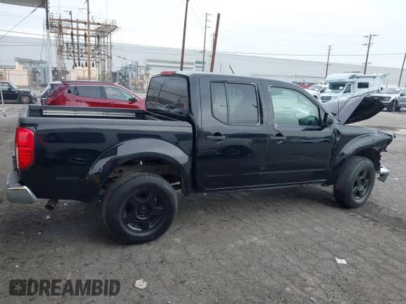 2005 Nissan Frontier SE with VIN 1N6AD07U45C403290, listed as a IAAI auction lot 41725521 with 166,344 mi miles and . Bid and sale history available at DreamBid. Image 14.