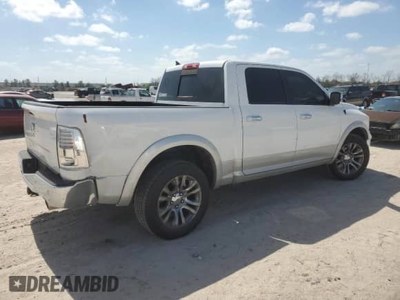 2015 Ram 1500 Laramie z VIN 1C6RR6NT7FS530649, wystawiony jako Copart lot #48950965 z przebiegiem 186 246 mil mil oraz Szkoda całkowita • Salvage title. Historia ofert i sprzedaży dostępna na DreamBid. Obrazek 3.