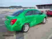 2014 Chevrolet Sonic LT с VIN 1G1JD5SH5E4228724, выставлен на аукционе IAAI как лот 41211677 с пробегом 76 044 миль миль и . История ставок и продаж доступна на DreamBid. Изображение 4.
