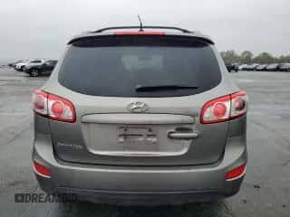 2012 Hyundai Santa Fe SE с VIN 5XYZH4AG3CG132283, выставлен на аукционе Copart как лот 82375095 с пробегом 195 340 миль миль и Списание • Salvage title. История ставок и продаж доступна на DreamBid. Изображение 6.