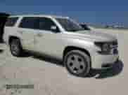 2015 Chevrolet Tahoe LTZ with VIN 1GNSCCKC9FR706761, listed as a Copart auction lot 86709605 with 181,421 mi miles and Salvage title. Bid and sale history available at DreamBid. Image 4.