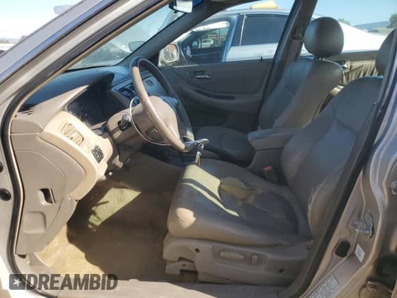 1999 Honda Accord EX with VIN 1HGCG1654XA010134, listed as a Copart auction lot 67599455 with 263,752 mi miles and Salvage title. Bid and sale history available at DreamBid. Image 7.