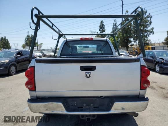 2007 Dodge 1500 ST z VIN 1D7HA18NX7S239162, wystawiony jako Copart lot #59396565 z przebiegiem 187 223 mil mil oraz Szkoda całkowita • Salvage title. Historia ofert i sprzedaży dostępna na DreamBid. Obrazek 6.
